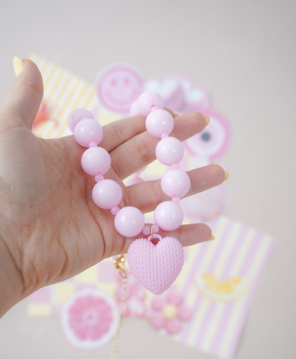 Collar tejido rosa