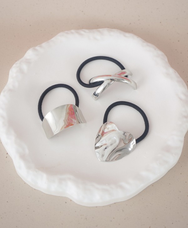 Pony cuffs plateados