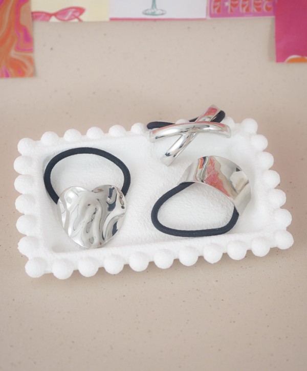Pony cuffs plateados