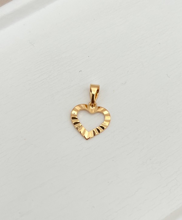 Dije corazón silueta