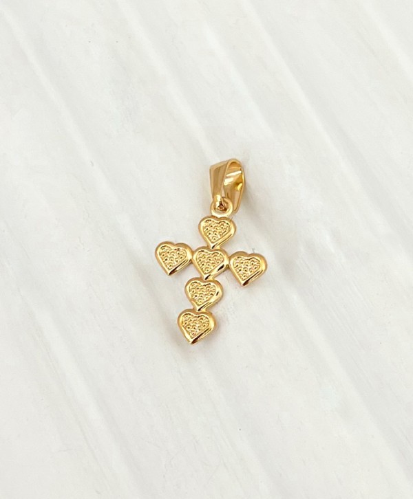 Cross of hearts charm